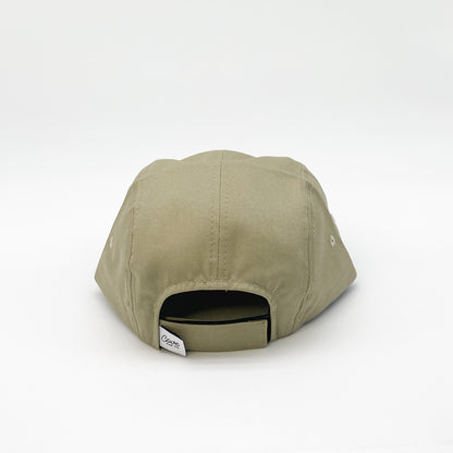 Khaki green adult hat. Minimalist five-panel design, made in Canada out of organic cotton. Hat has an adjustable soft velcro closure.